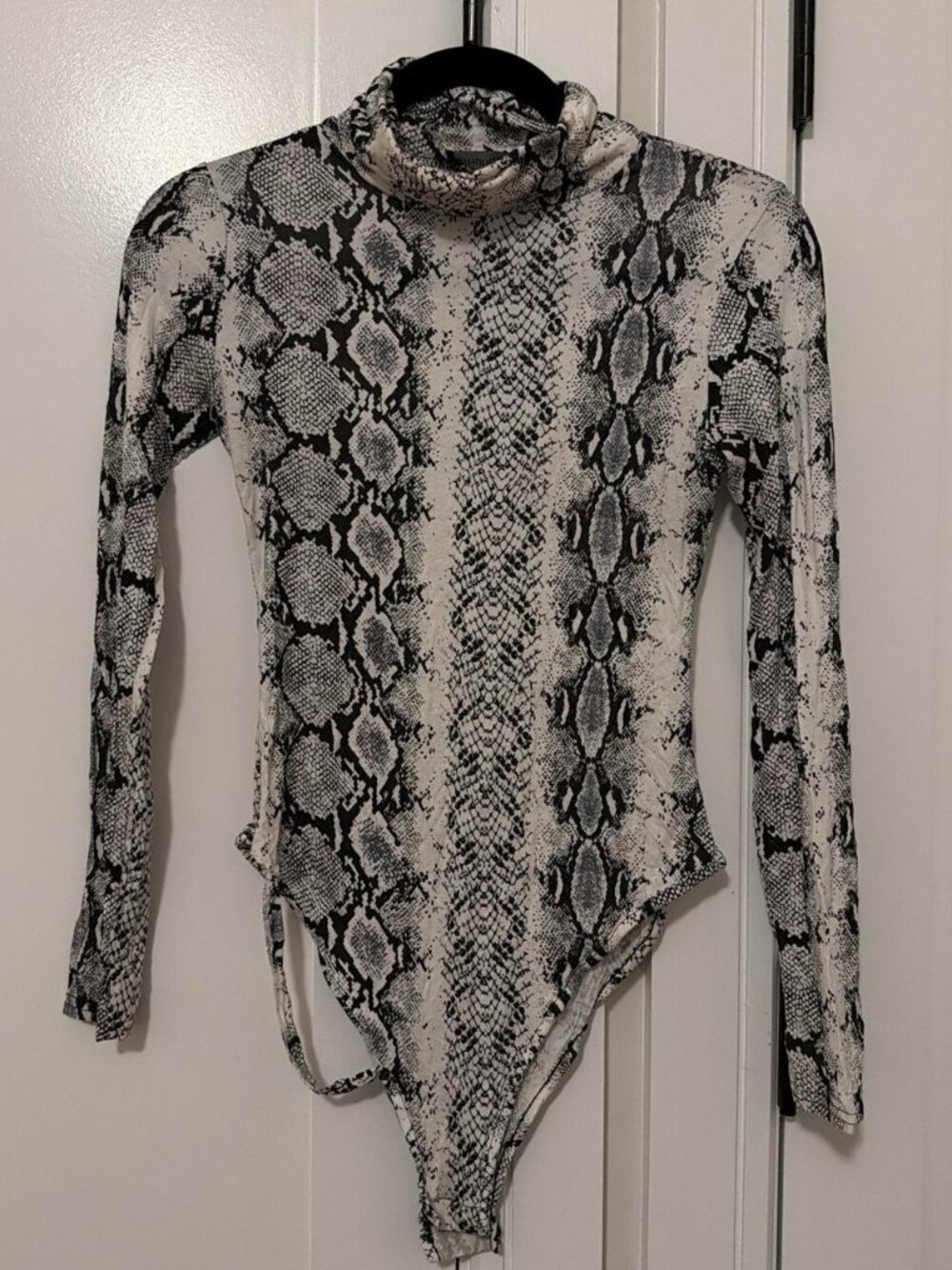 Black and white snake print bodysuit, tear on under seam